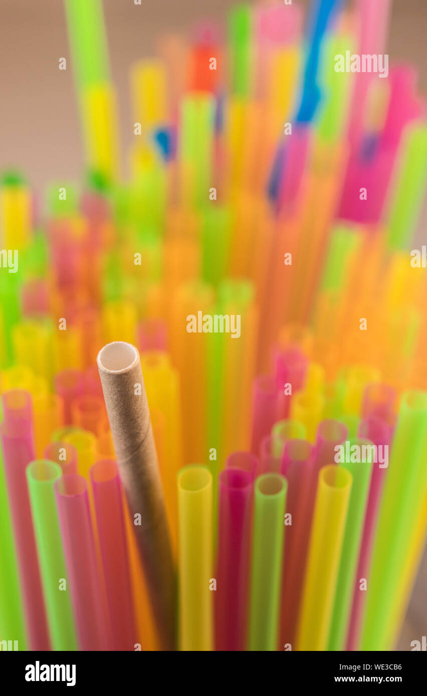 Natural Straw and straws plastic drinking background colourful full