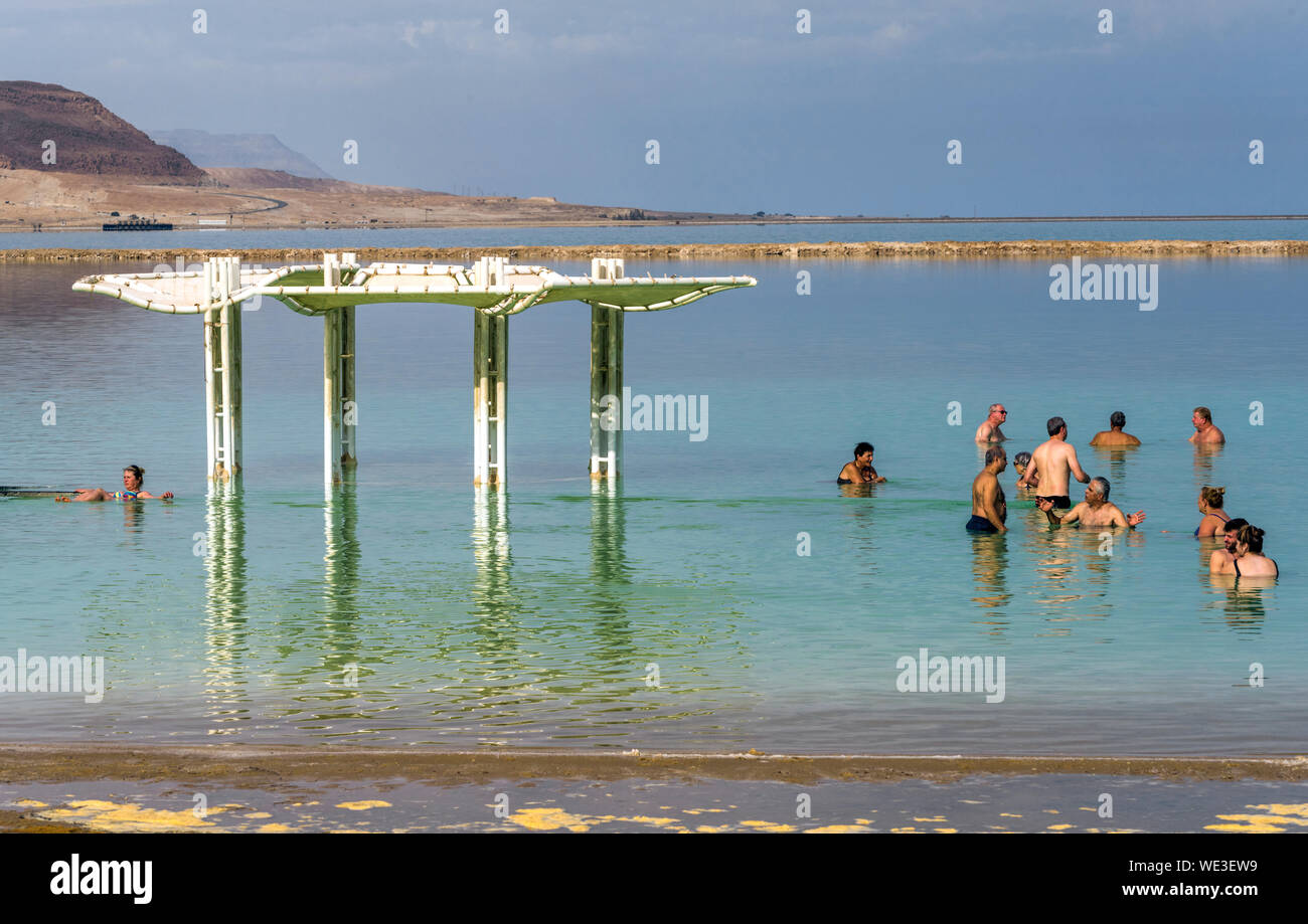 Holiday makers at the Dead sea, Israel Stock Photo