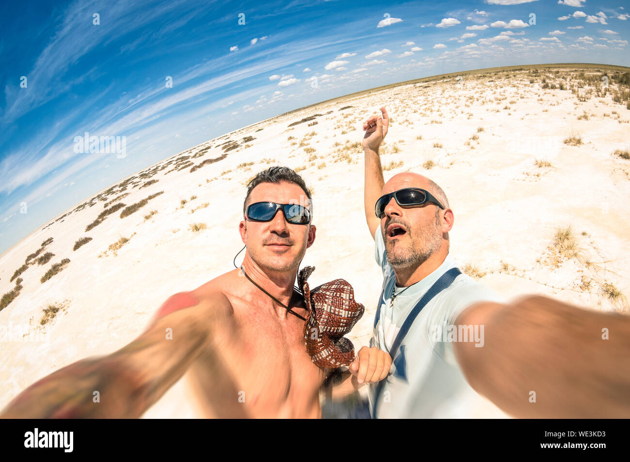 Men Wearing Sunglasses Standing At Beach Stock Photo - Alamy