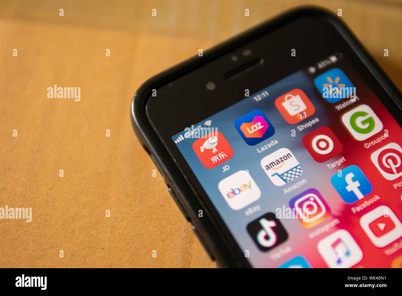 Bangkok, Thailand - August 22, 2019 : iPhone 7 showing its screen with JD, Chinese e-commerce application, Lazada, Shopee, Walmart, Ebay, Amazon and o Stock Photo