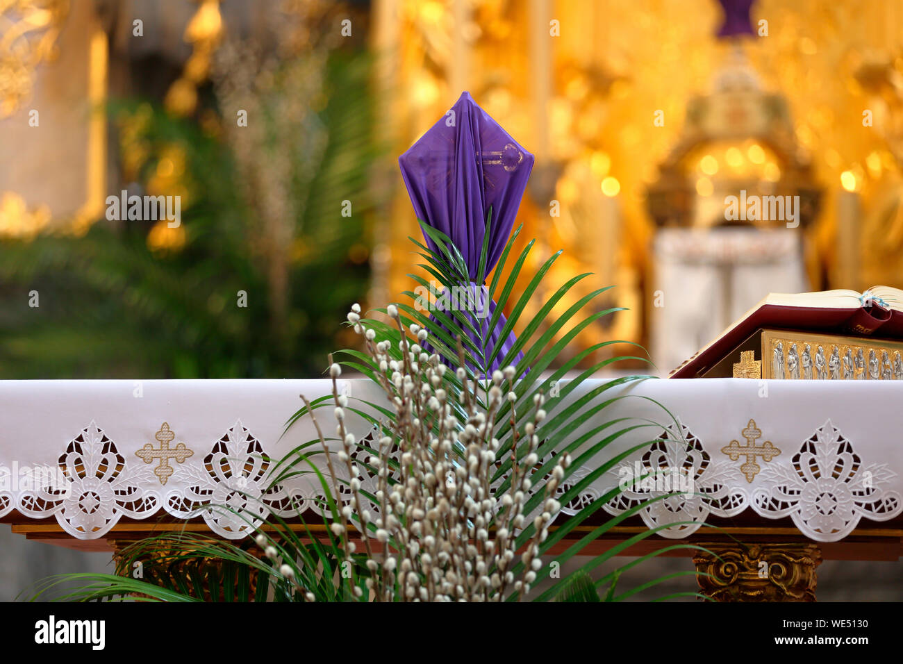 Covered cross by purple cloth on the altar in Lent Season and Holy Week