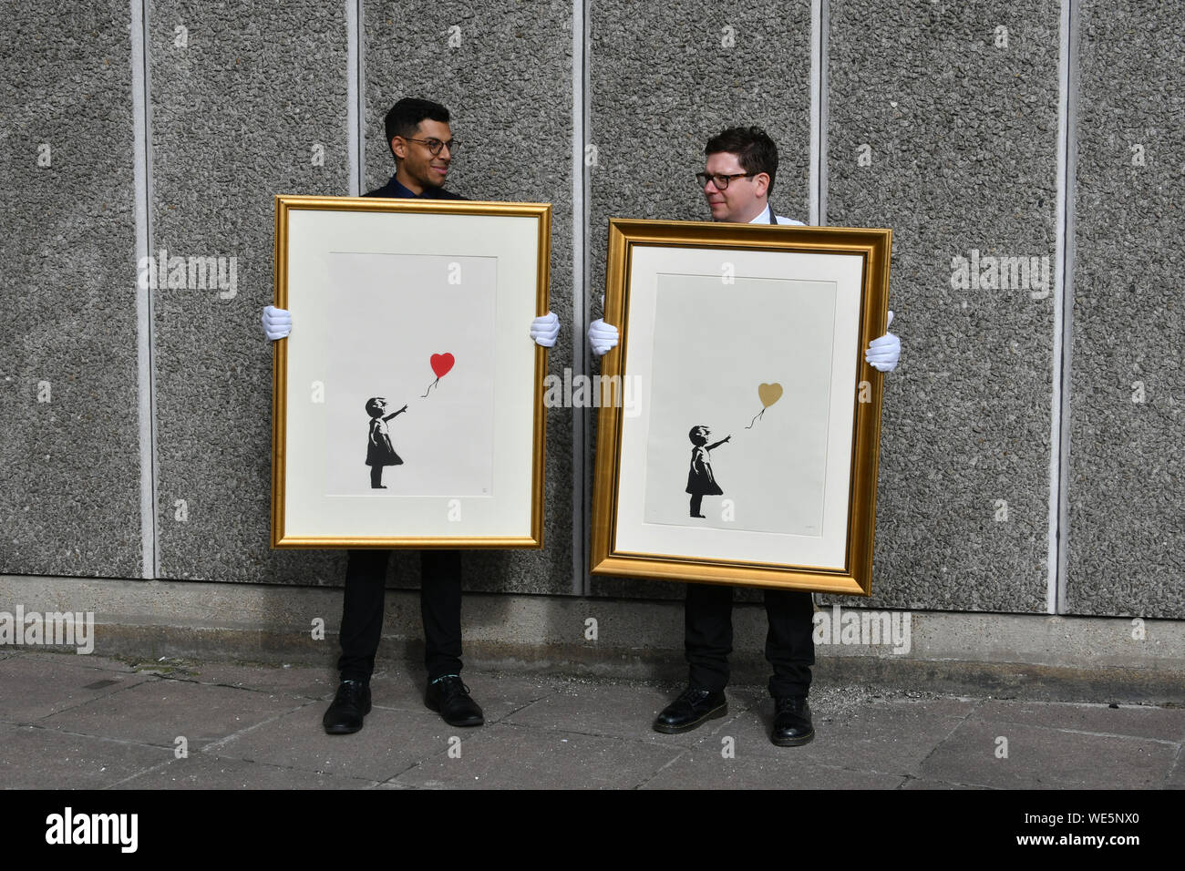 London, UK. 30th Aug, 2019. Anonymous street artist Banksy's iconic work  Girl With Balloon goes on display near one of the original locations the  artwork appeared at, National Theatre, South Bank in