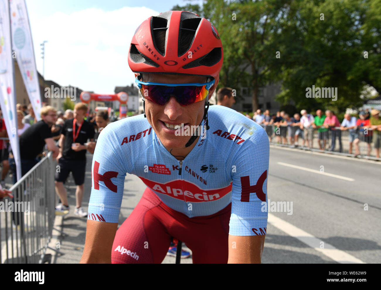 Marburg, Germany. 30th Aug, 2019. Cycling: UCI Europaserie, Germany Tour,  2nd stage from Marburg to Göttingen (202, 00 km). The German Nils Politt of  Team Katusha-Alpecin smiles before the start. Credit: dpa