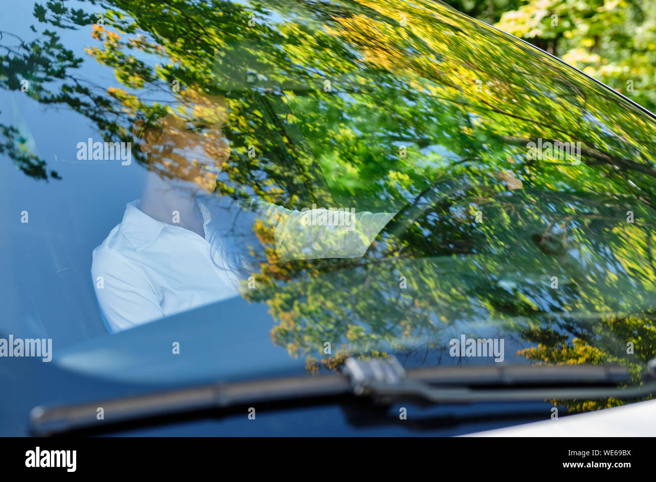 Girl behind steering wheel hi-res stock photography and images - Alamy