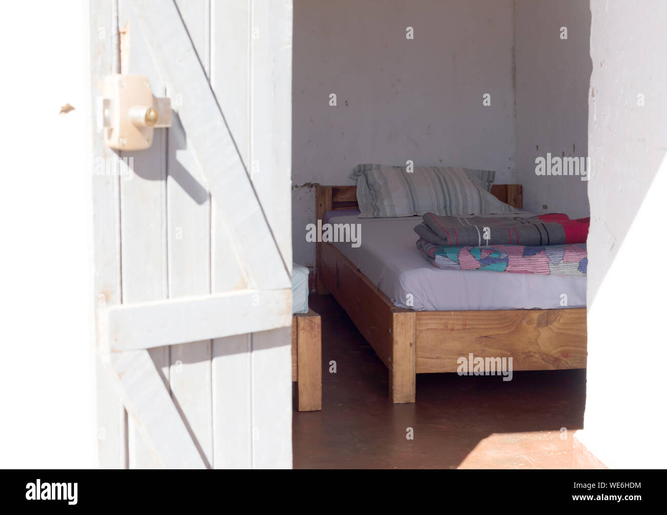 Old wooden bed (dormitory) in a non-touristic part of Madagascar Stock Photo