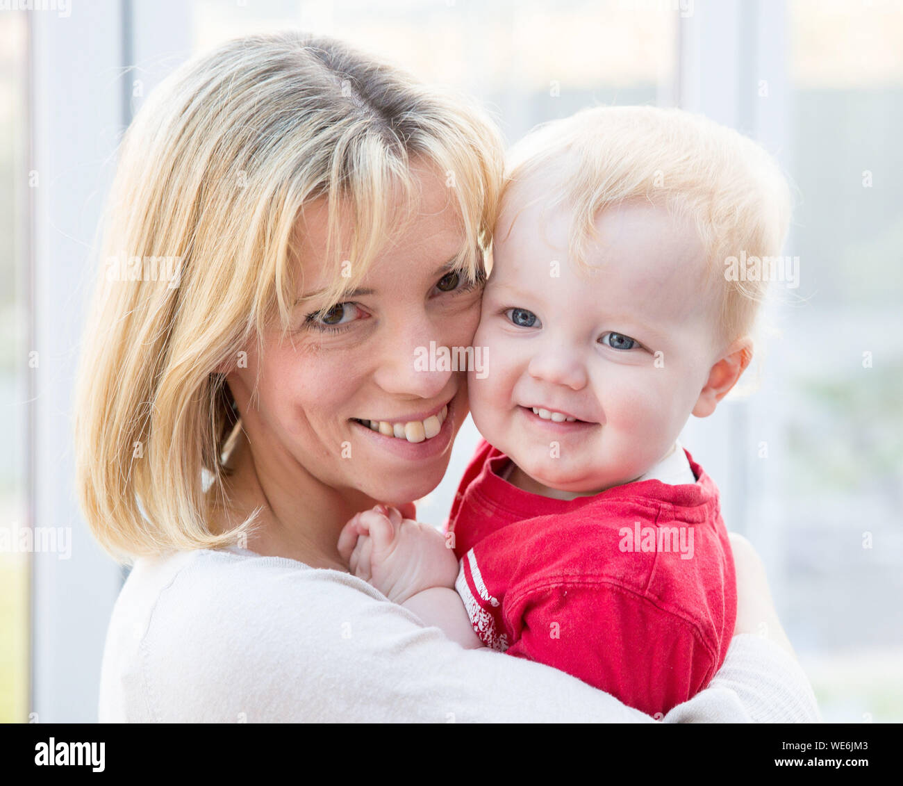 Mother and child smiling Stock Photo - Alamy