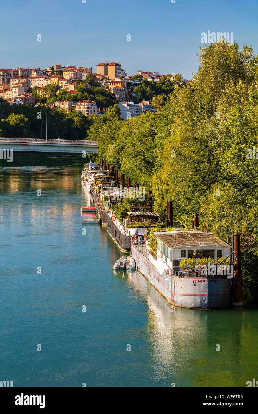 France, Rhone, Lyon, historical site listed as World Heritage by UNESCO, dock De Serbie with a view of the bridge Winston Churchill and the Croix Rousse, Rhone River banks Stock Photo