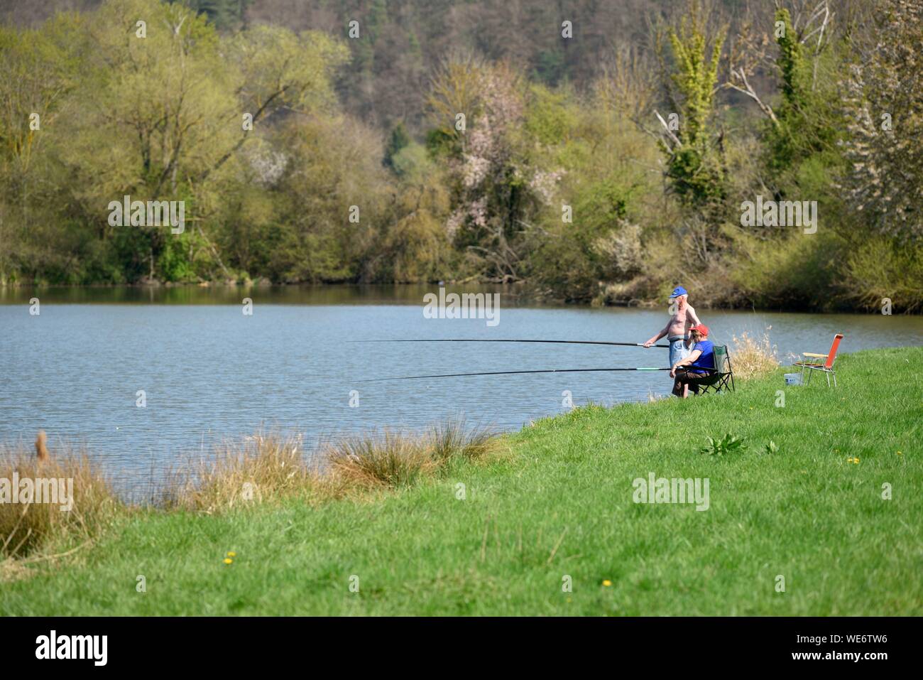 France, Meurthe and Moselle, Villey Saint Etienne, Terrouin Valley jumping into the Moselle, fishermen couple Stock Photo