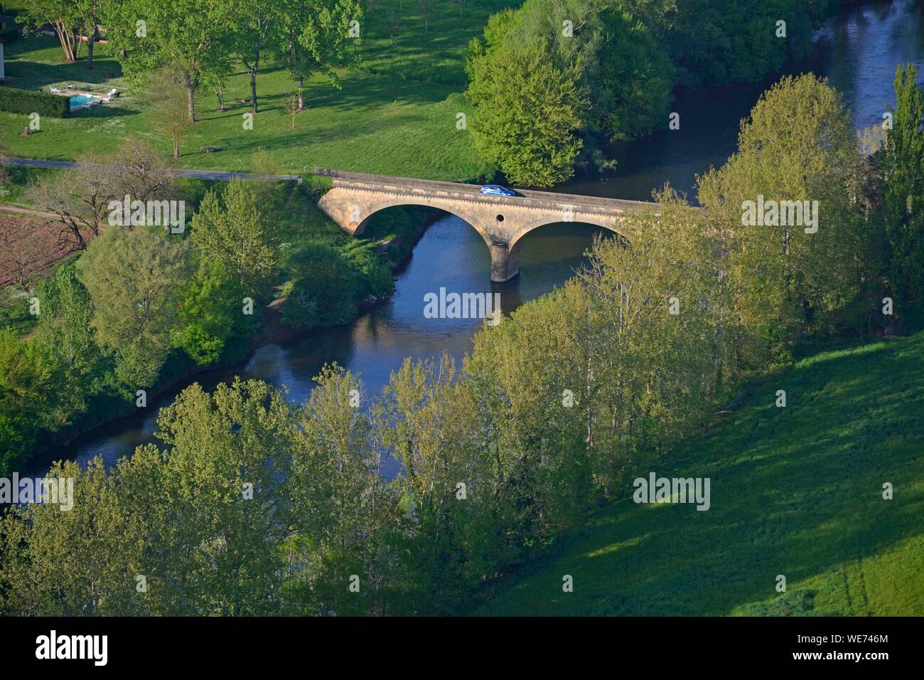 France, Dordogne, Black Perigord, the Vezere Valley, Village of Thonac, the bridge (aerial view) Stock Photo