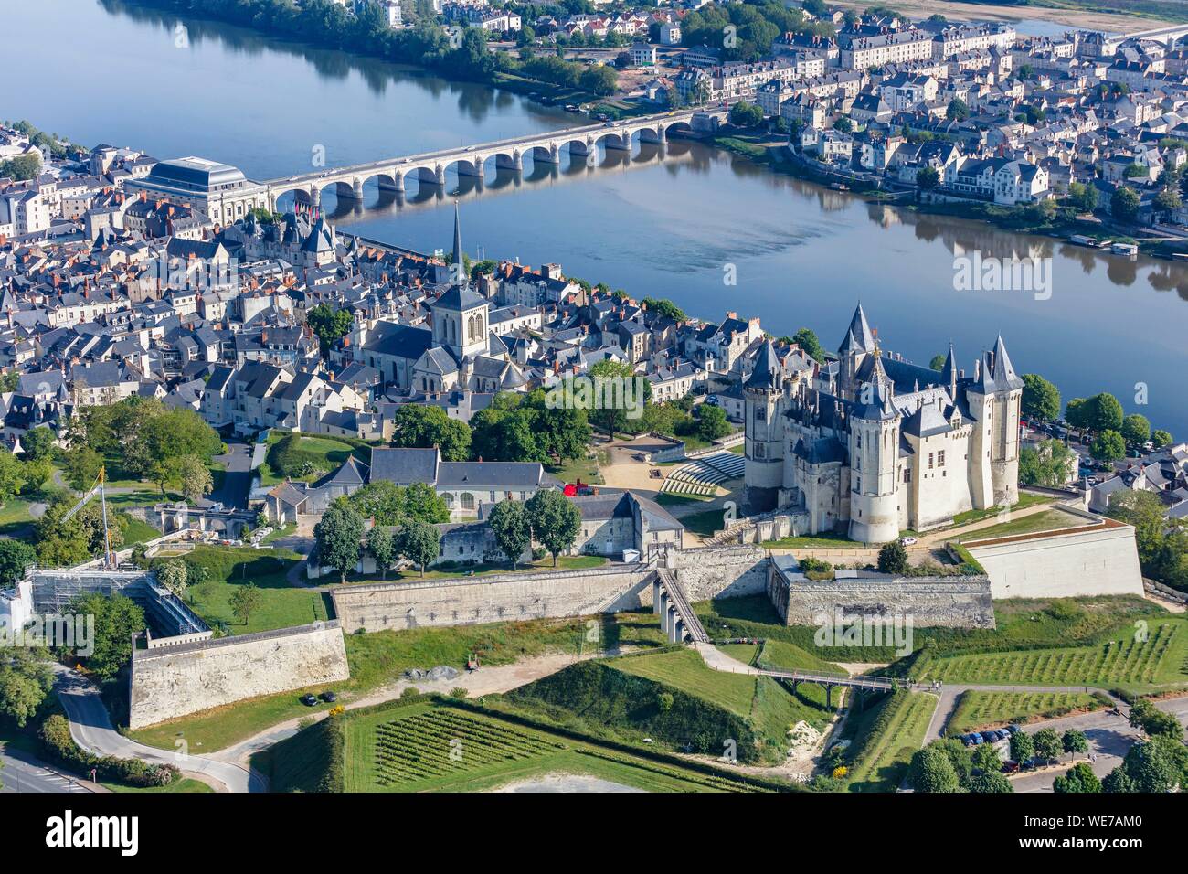 France, Maine et Loire, Loire valley listed as World Heritage by UNESCO, Saumur, the town and the castle near the Loire river (aerial view) Stock Photo