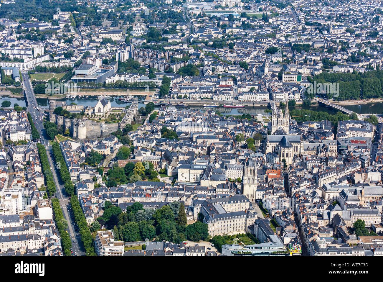 France, Maine et Loire, Loire valley listed as World Heritage by UNESCO, Angers, the town, the castle, Saint Aubin tower and Saint Maurice cathedral (aerial view) Stock Photo