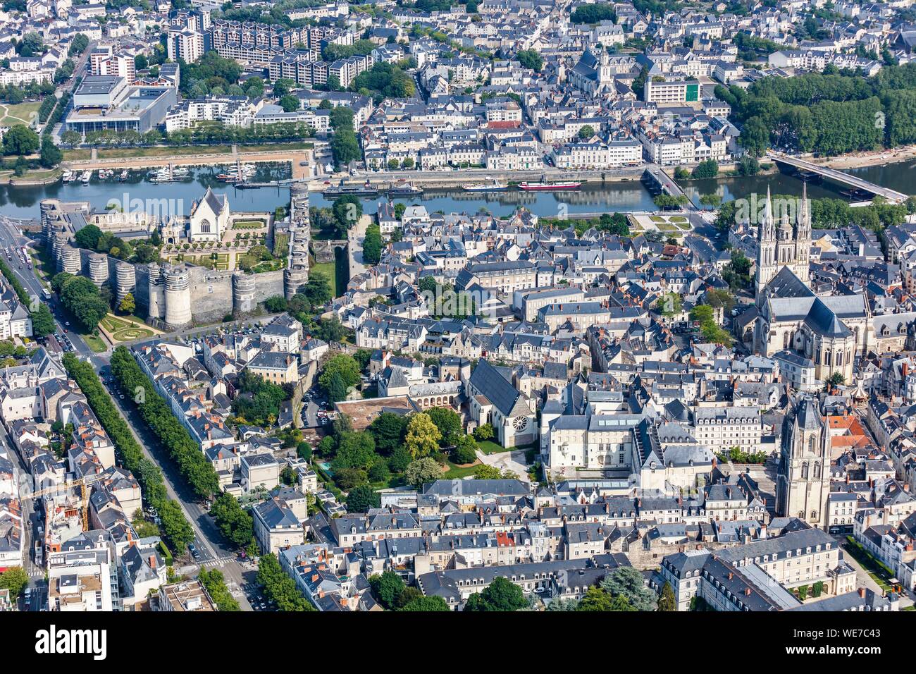 France, Maine et Loire, Loire valley listed as World Heritage by UNESCO, Angers, the town, the castle, Saint Aubin tower and Saint Maurice cathedral (aerial view) Stock Photo