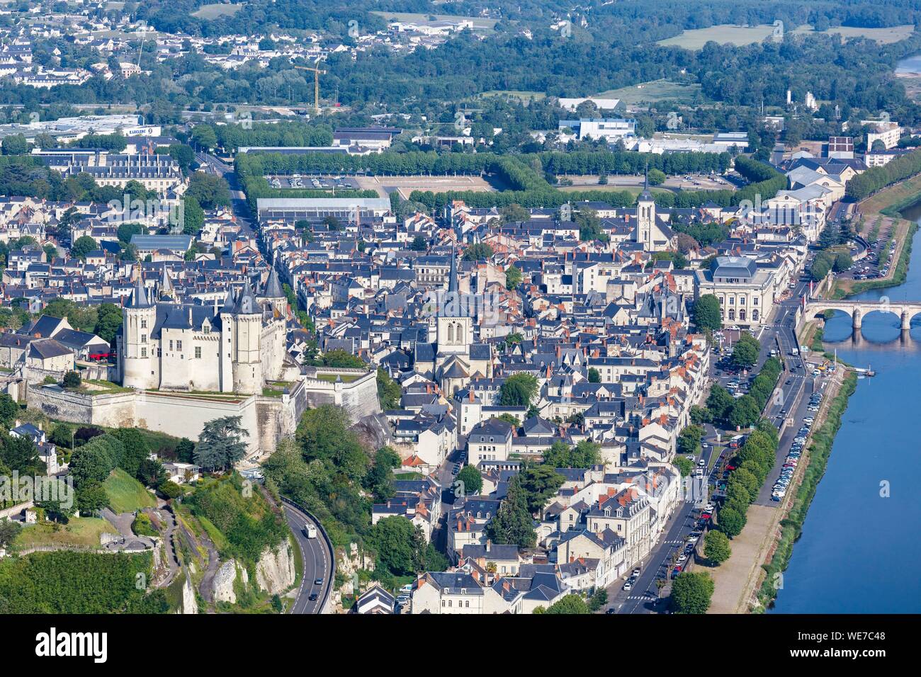 France, Maine et Loire, Loire valley listed as World Heritage by UNESCO, Saumur, the town and the castle near the Loire river (aerial view) Stock Photo