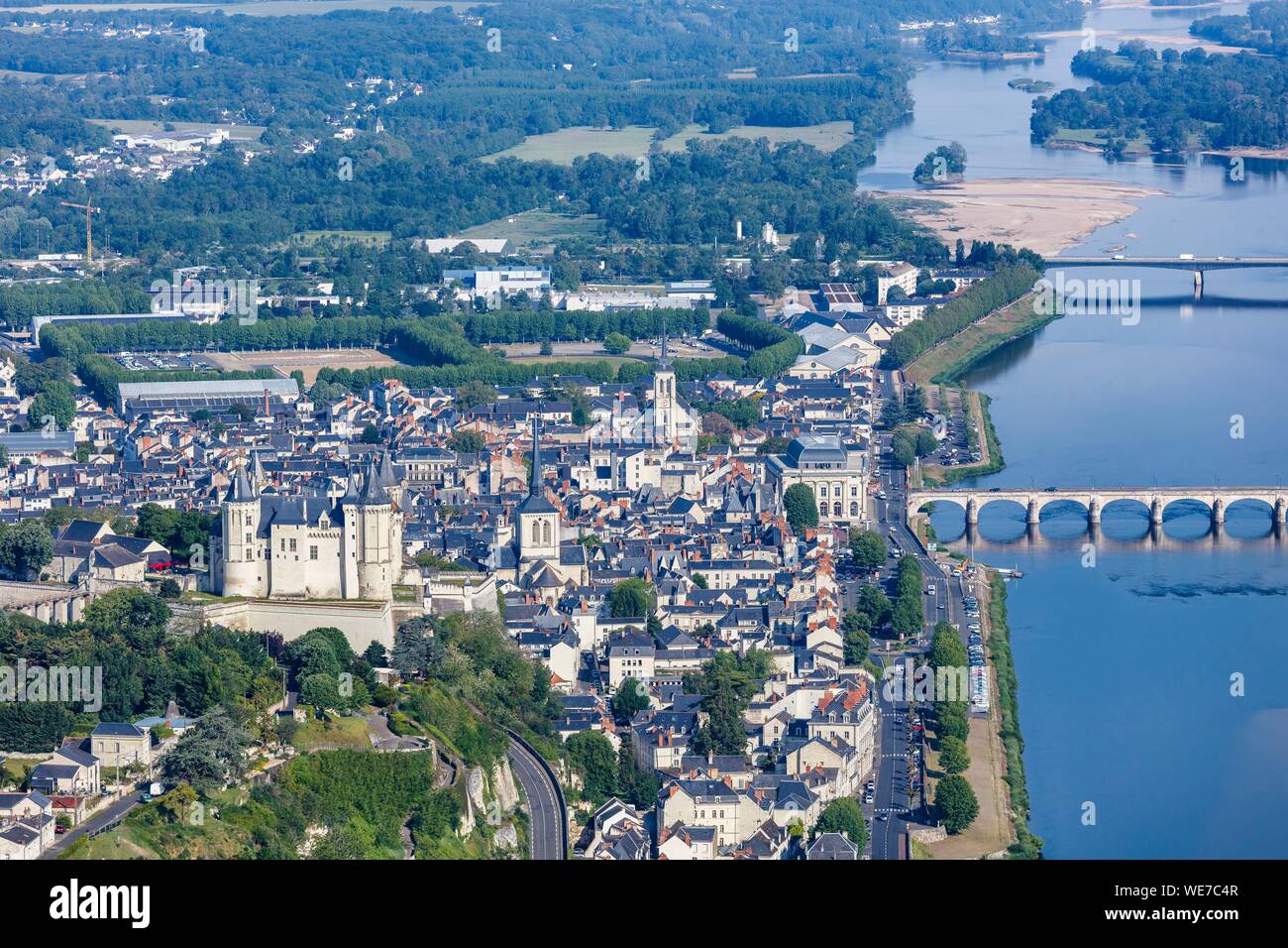 France, Maine et Loire, Loire valley listed as World Heritage by UNESCO, Saumur, the town and the castle near the Loire river (aerial view) Stock Photo