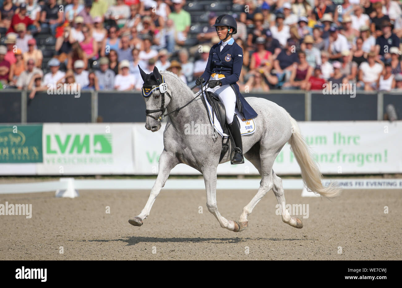 30 August 2019, Lower Saxony, Luhmühlen: Equestrian sport, eventing, European championship: The Swedish event rider Louise Romeike on Waikiki rides in the dressage competition. Photo: Friso Gentsch/dpa Stock Photo