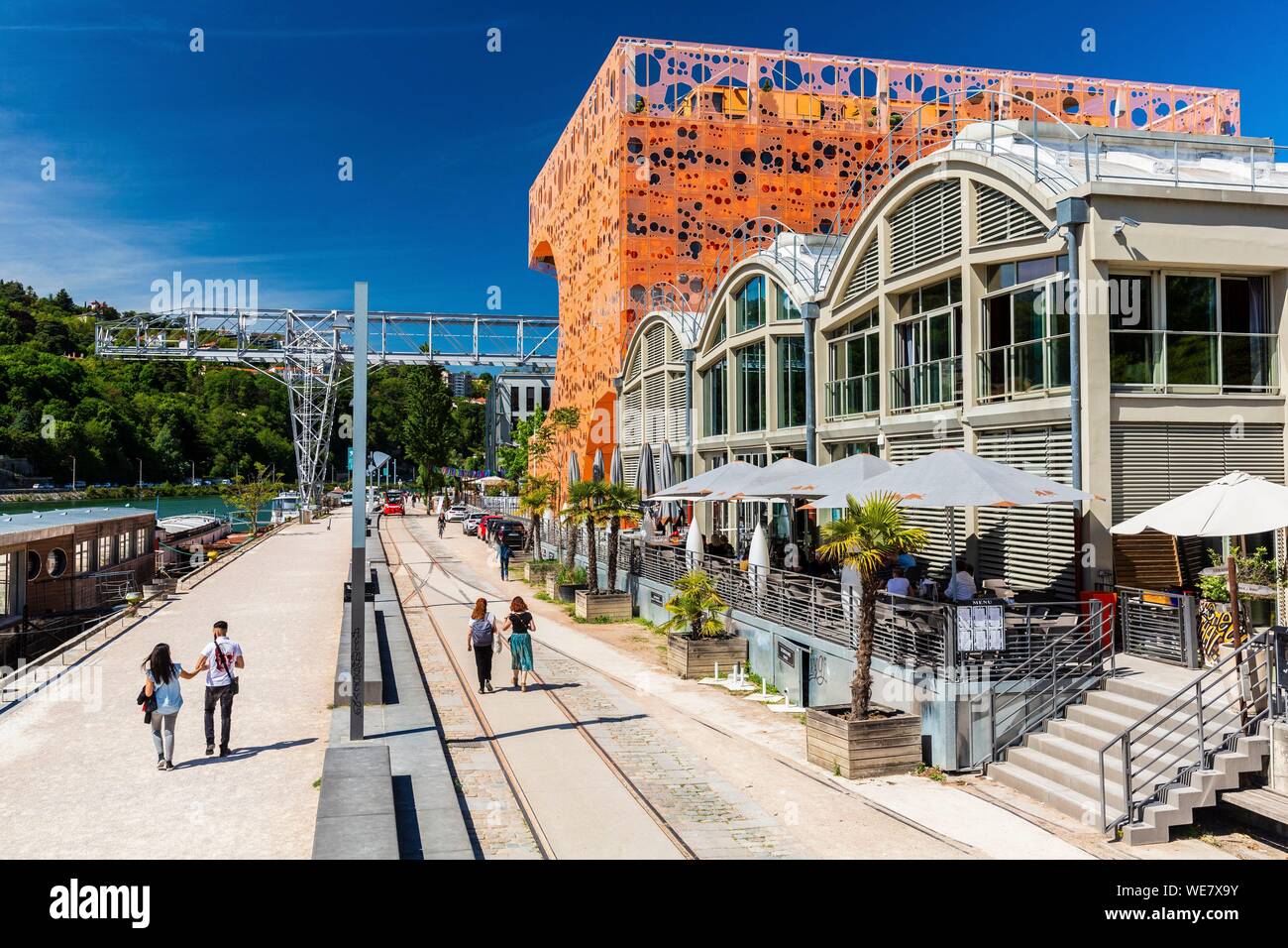 France, Rhone, Lyon, La Confluence district south of the Presqu'ile, close to the confluence of the Rhone and the Saone rivers, quai Rambaud along the former docks, Selcius restaurant and Pavillon des Salins also called Cube Orange Stock Photo