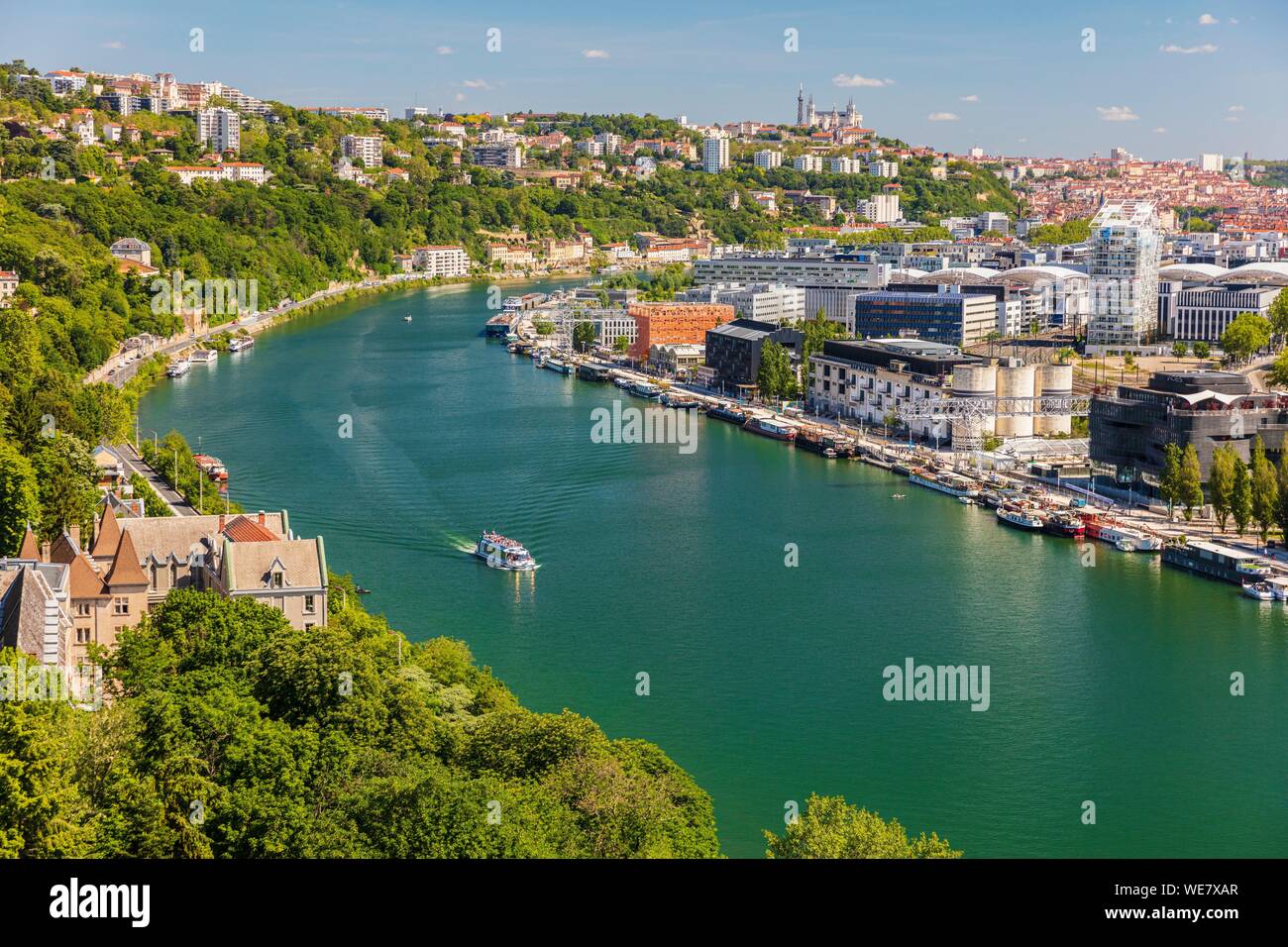 France, Rhône (69), Lyon, district of La Confluence in the south of the peninsula, first French quarter certified sustainable by the WWF, view of the quai Rambaud along the old docks with the Green Cube, the Orange Cube, the Ycone tower and Notre Dame de Fourviere Basilica Stock Photo