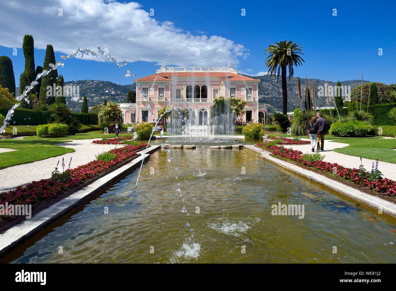 France, Alpes Maritimes, Saint Jean Cap Ferrat, Ephrussi de Rothschild villa and garden, large pond and water jets in the French garden Stock Photo