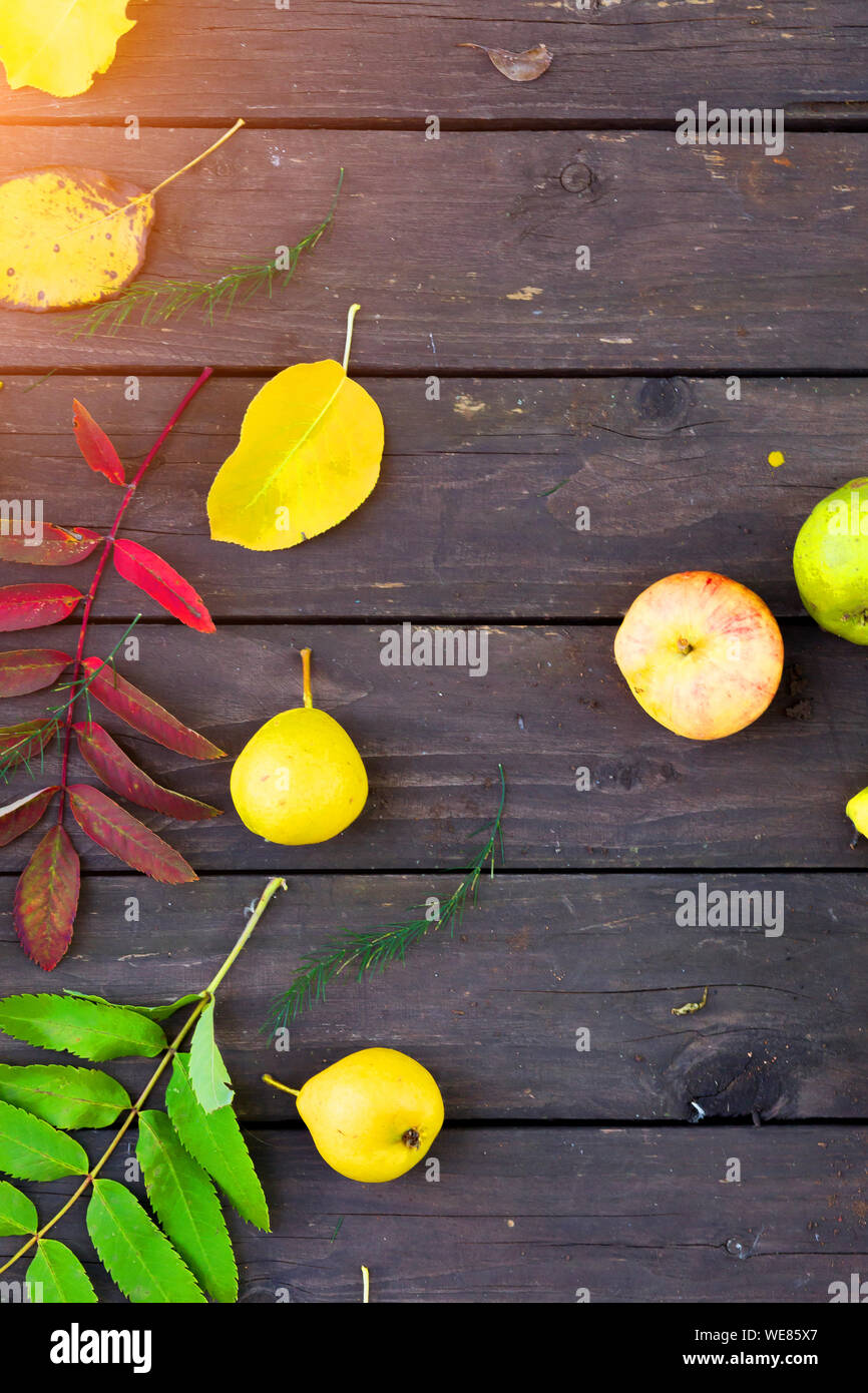 Apples and pears on a wooden background Stock Photo