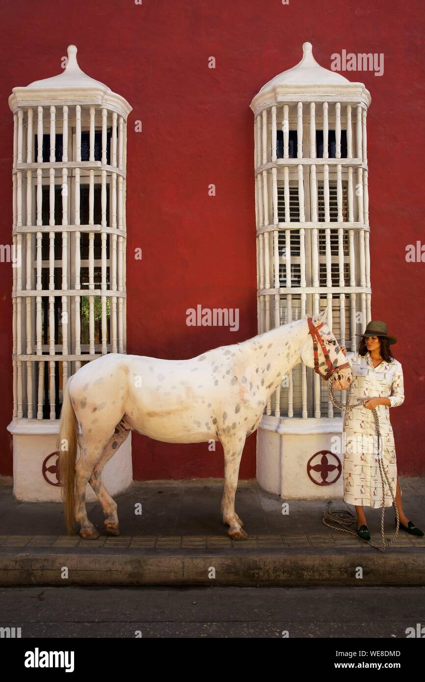 Colombia, Bolivar Department, Cartagena, listed as World heritage by UNESCO, horsewoman in the old town Stock Photo