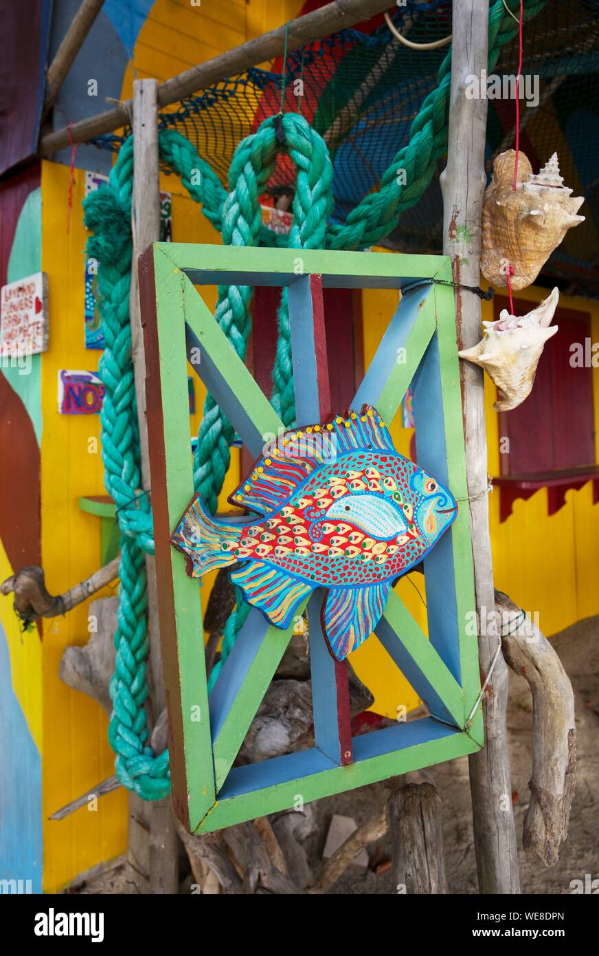 Colombia, Providencia island, door of a beach restaurant decorated with a colorful fish on the beach of Suroeste Stock Photo