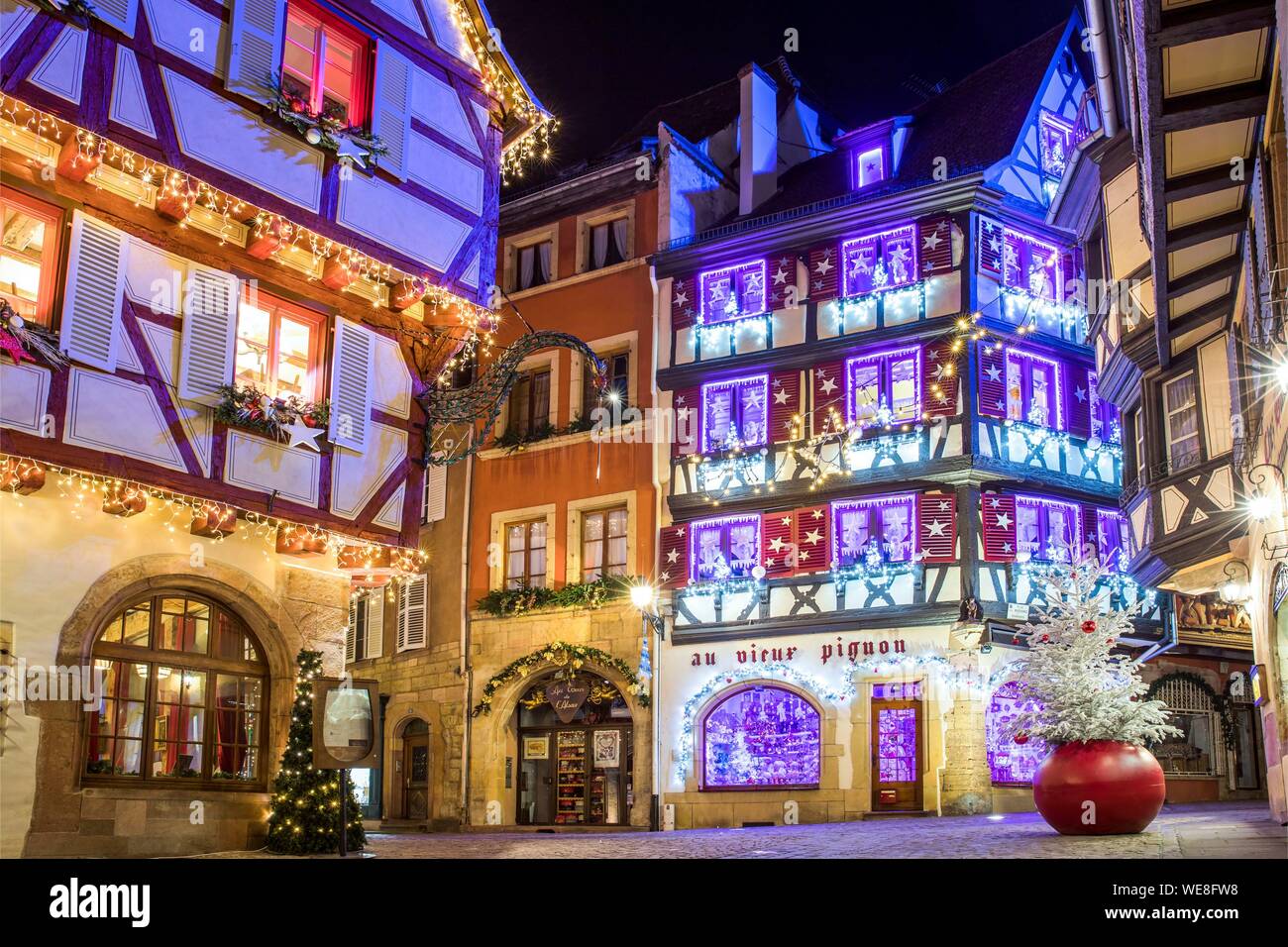 France, Haut Rhin, Alsace Wine Route, Colmar, Christmas lights on rue des Marchands Stock Photo
