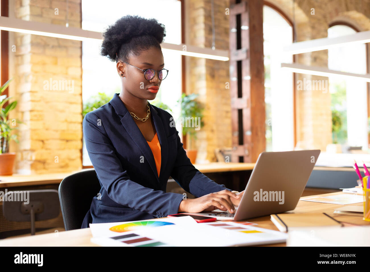 Interior designer planning new project using laptop Stock Photo - Alamy