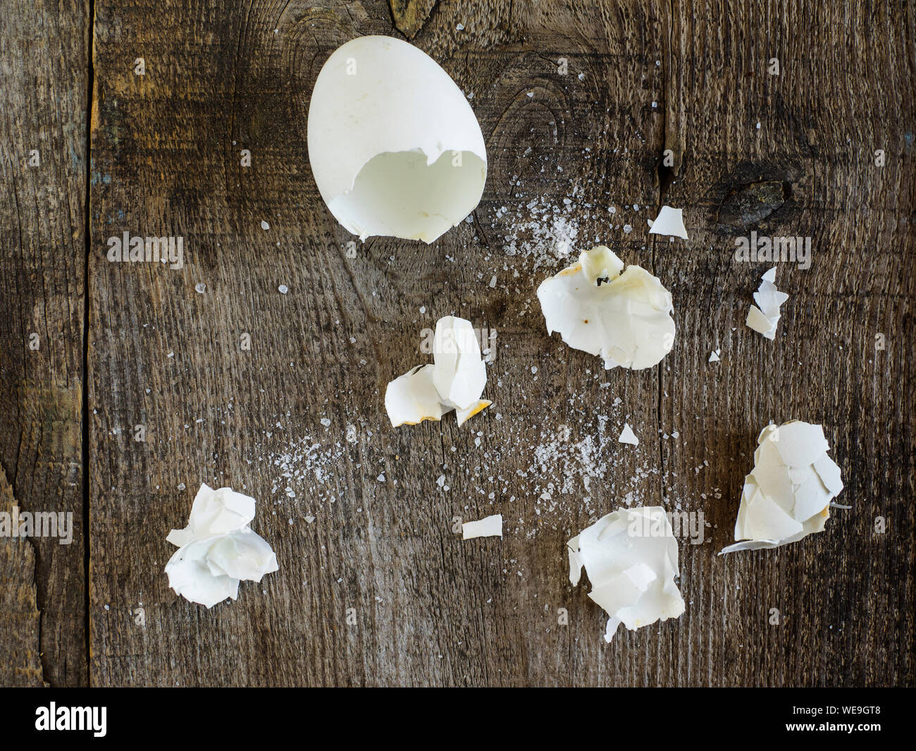 Directly Above View Of Broken Eggshell On Table Stock Photo