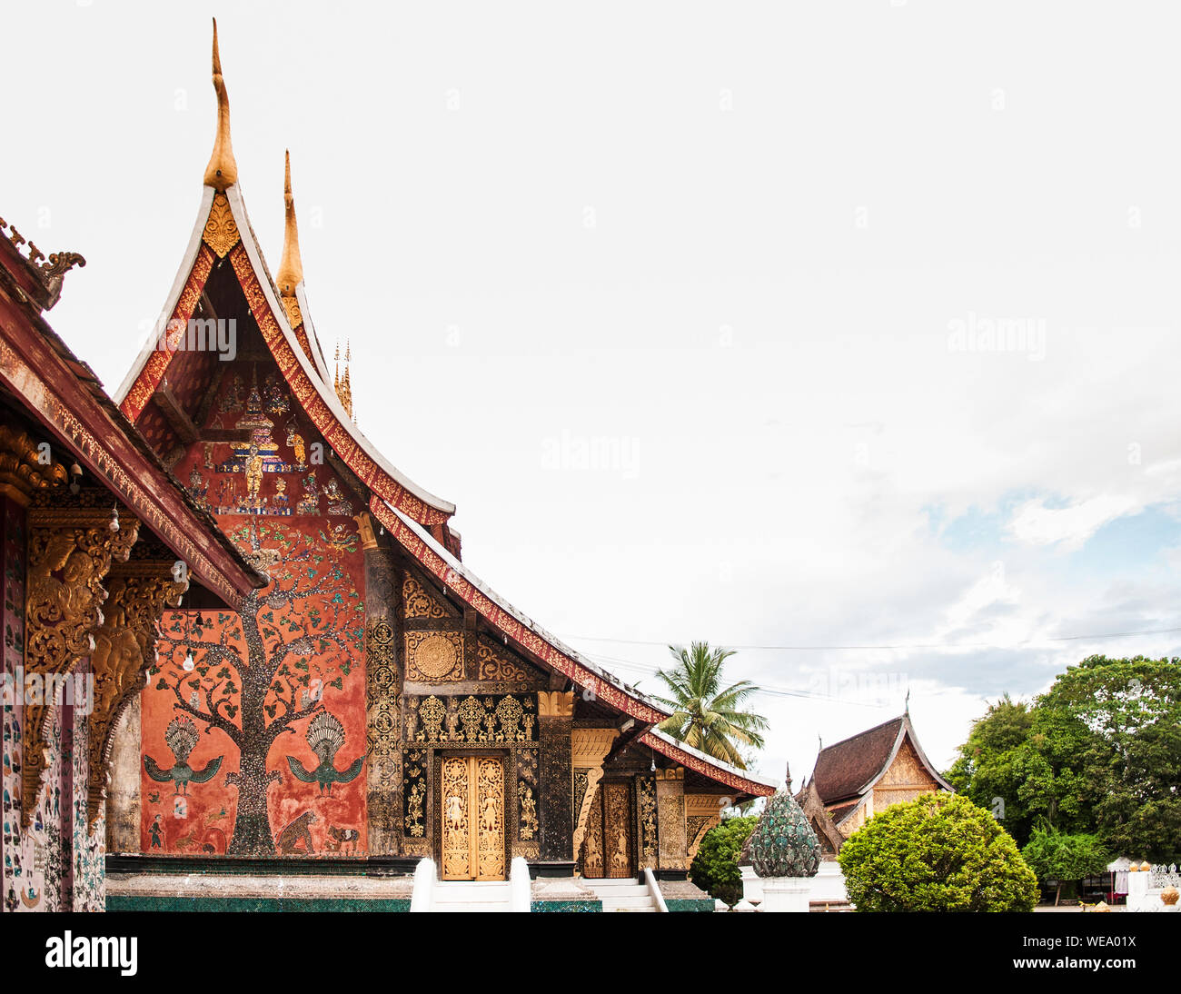 Xieng Tree A tree of life mural art was set in colored glass mosaics at Wat Xieng ...