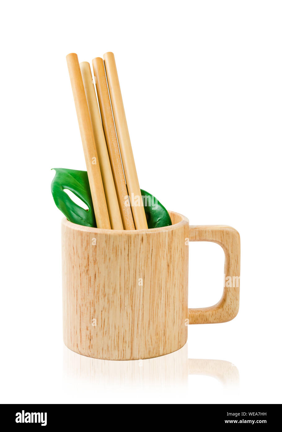 Biodegradable bamboo straws with wooden glass isolated on white