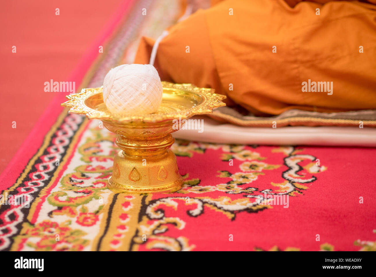 Close-up Of Thread Spool On Container During Wedding Ceremony Stock Photo