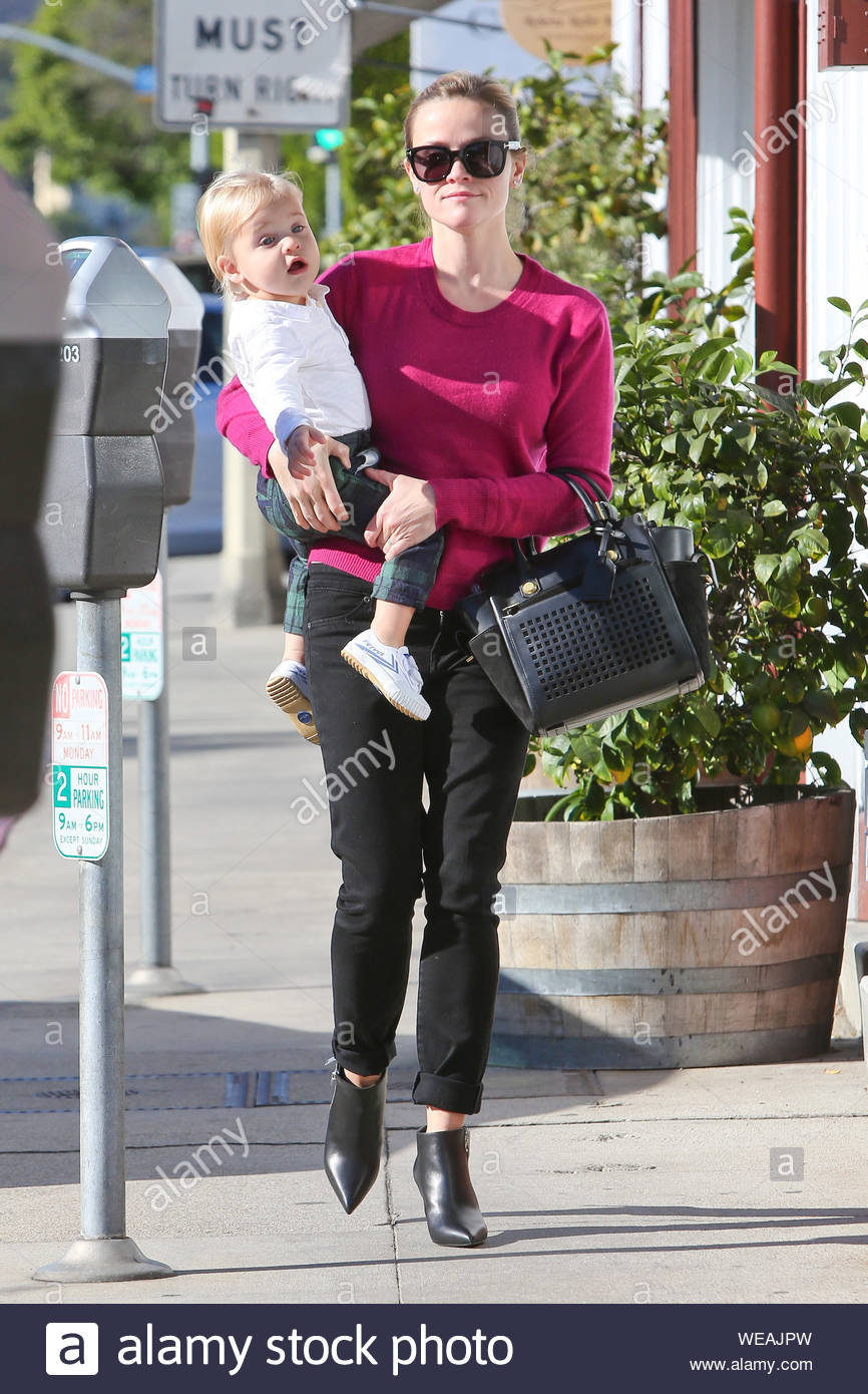 pink sweater black pants