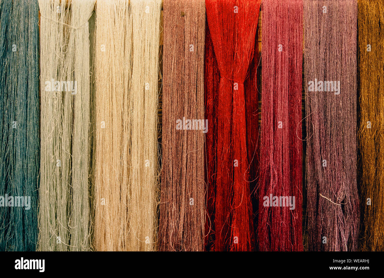 Details of natural colourful silk thread fiber with natural colour dye process. Traditional