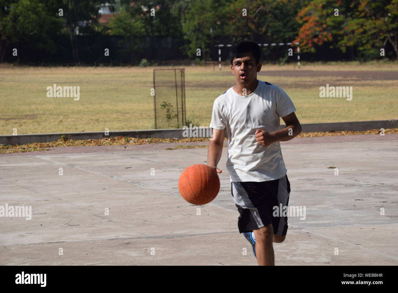 man playing basketball
