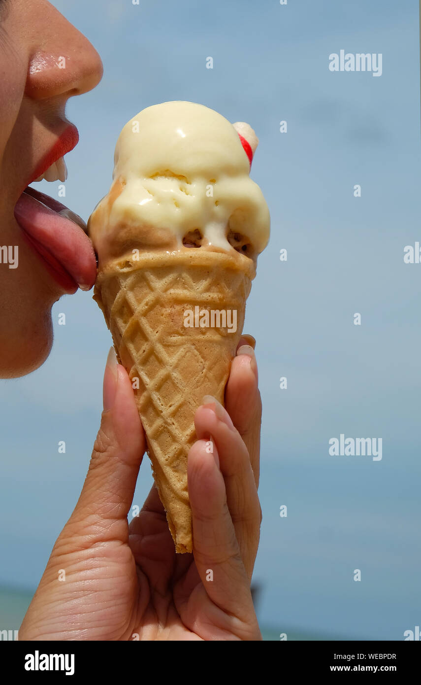 Licking ice cream cone hires stock photography and images Alamy