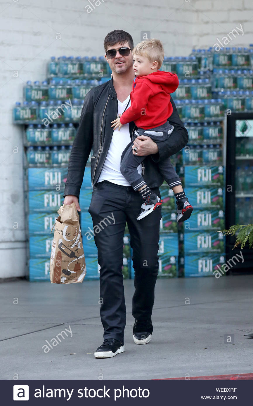 West Hollywood Ca Robin Thicke And His Son Julian Pick Up Some