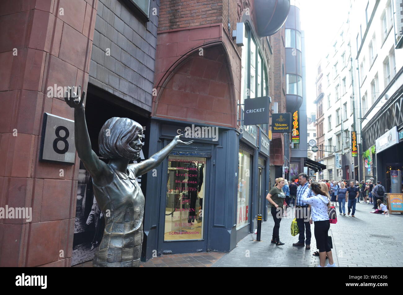 Statue of Cilla Black on Mathew Street in Liverpool, England, UK outside the entrance to the original Cavern Club where The Beatles played. Stock Photo