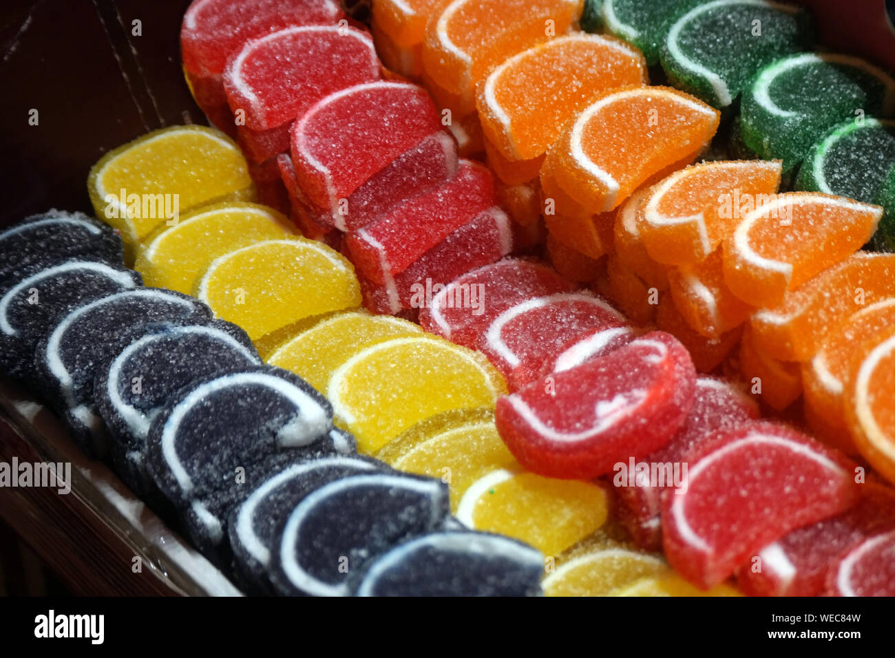 Colorful lollipops and different colored round candy. Stock Photo