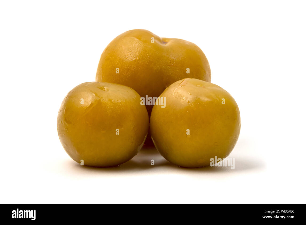 Torshi plums, a traditional pickled fruit of the cuisines of many Balkan and Middle East countries Stock Photo