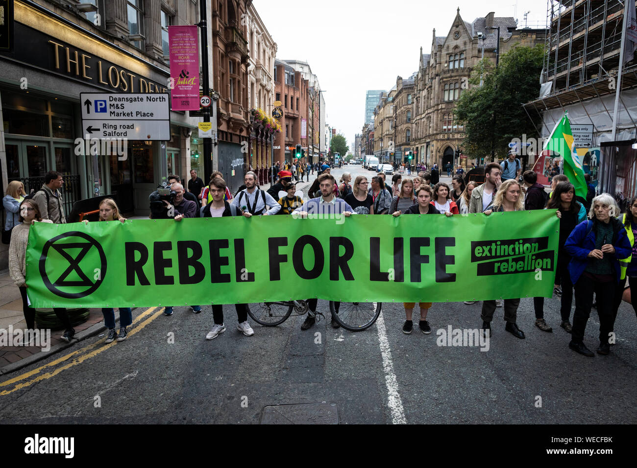 Manchester, UK. 30th Aug, 2019. The Northern Rebellion which is part of the Extinction Rebellion movement occupied one of the major transport routes through the city this morning. Deansgate, came to a standstill as protesters took to the streets in pursuit for peaceful action to create changes needed to overcome climate change. Credit: Andy Barton/Alamy Live News Stock Photo