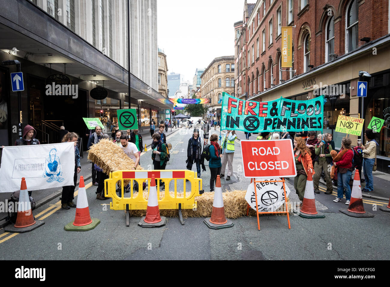 Manchester, UK. 30th Aug, 2019. The Northern Rebellion which is part of the Extinction Rebellion movement occupied one of the major transport routes through the city this morning. Deansgate, came to a standstill as protesters took to the streets in pursuit for peaceful action to create changes needed to overcome climate change. Credit: Andy Barton/Alamy Live News Stock Photo