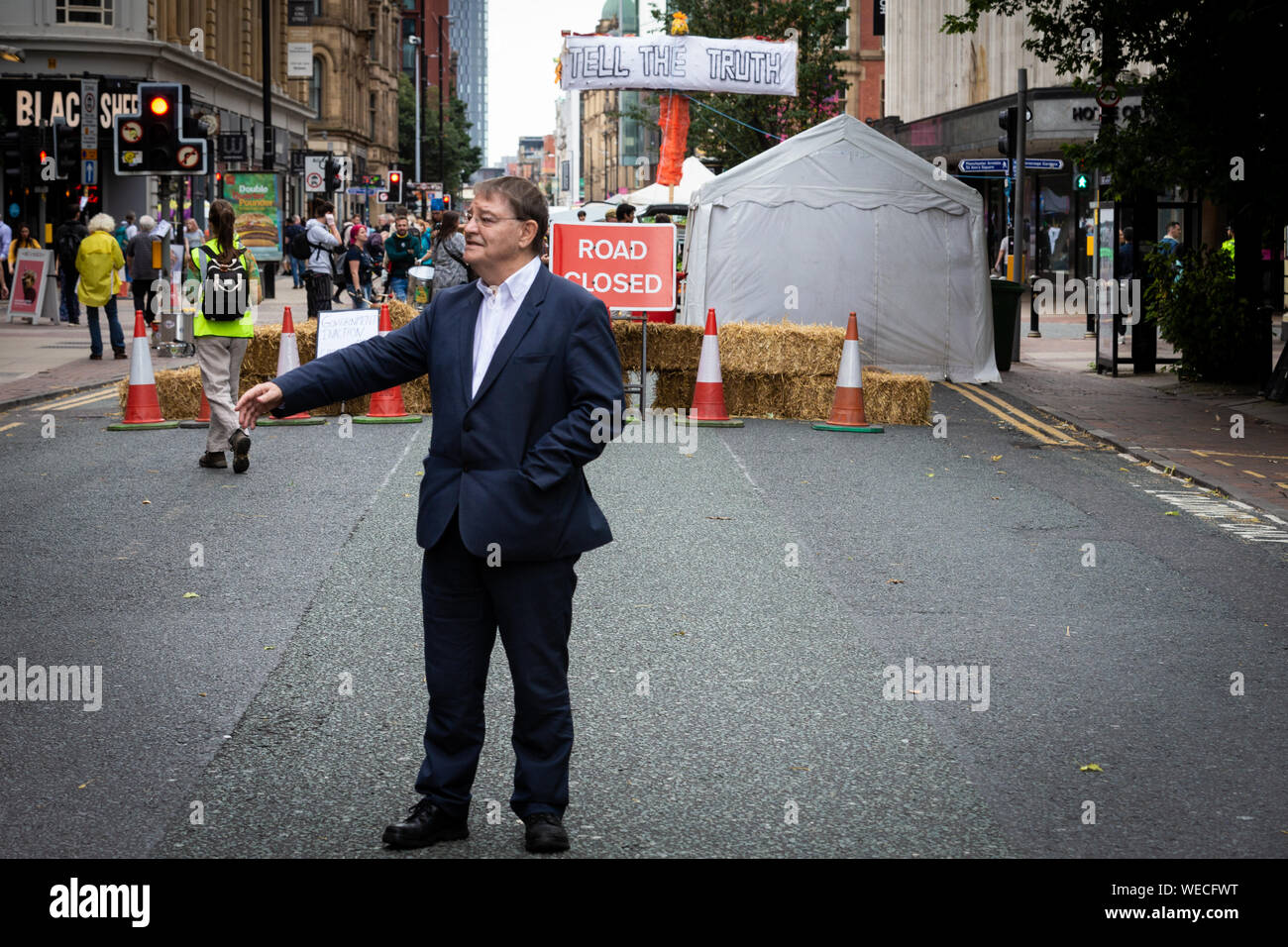 Manchester, UK. 30th Aug, 2019. The councils Pat Karney visits the Northern Rebellion movement which occupied one of the major transport routes through the city this morning. Deansgate, came to a standstill as protesters took to the streets in pursuit for peaceful action to create changes needed to overcome climate change. Credit: Andy Barton/Alamy Live News Stock Photo