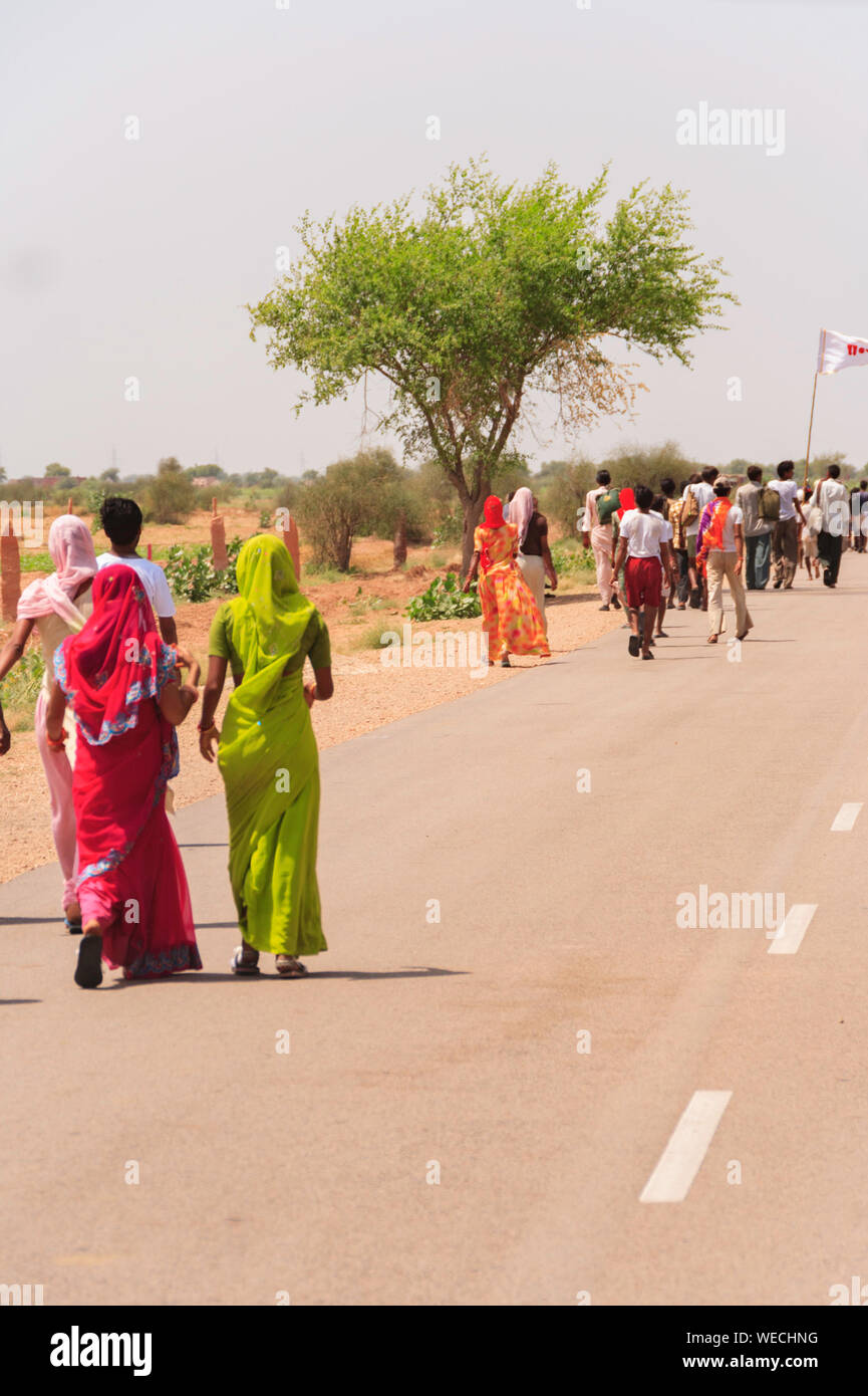 Pilgrimage of Indian people on a road Stock Photo