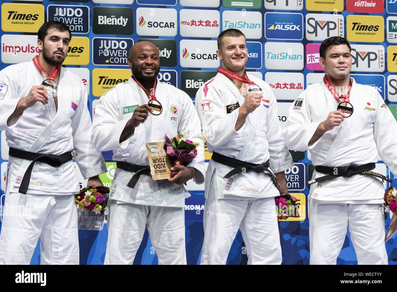 Tokyo, Japan. 30th Aug, 2019. (L to R) Silver medalist Niyaz Ilyasov, gol medalist Jorge Fonseca of Portugal, bronze medalists Michael Korrel of the Netherlands and Aaron Wolf of Japan, pose for the cameras during the award ceremony of the men's -100kg category at World Judo Championships Tokyo 2019 in the Nippon Budokan. The World Judo Championships Tokyo 2019 is held from August 25 to September 1st. Credit: Rodrigo Reyes Marin/ZUMA Wire/Alamy Live News Stock Photo