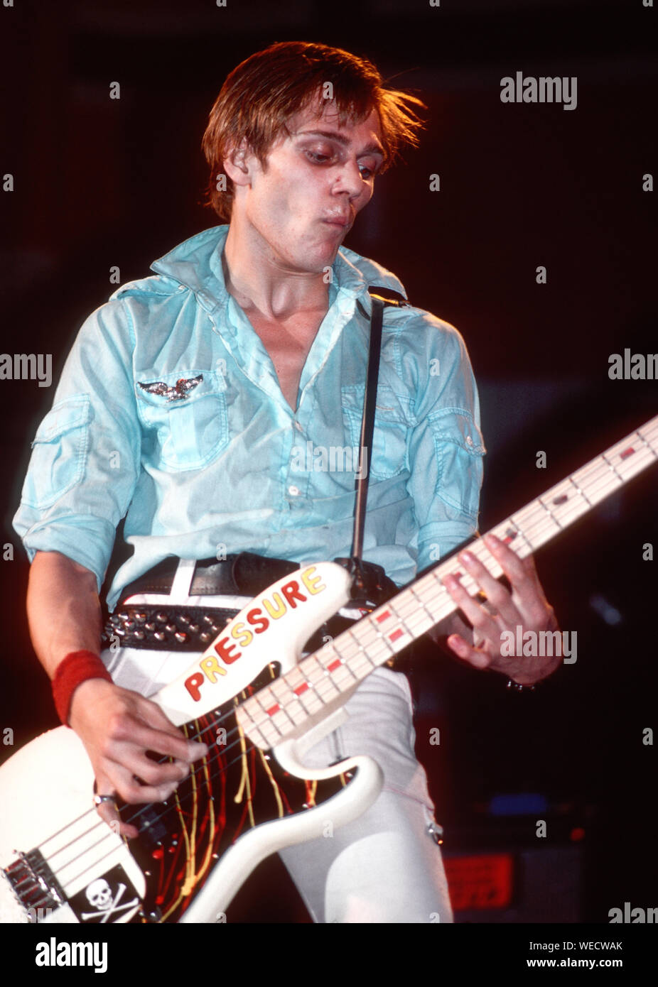 Paul Simonon of the Clash performs onstage at the Palladium Theatre, NYC, on February 17, 1979 Stock Photo