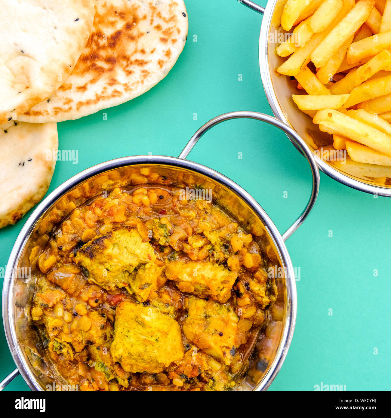 Indian Style Traditional Chicken Dhansak Curry With Chips or fries