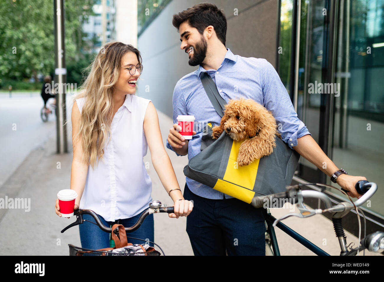 Couple in love with dog walking and smiling outdoor Stock Photo - Alamy