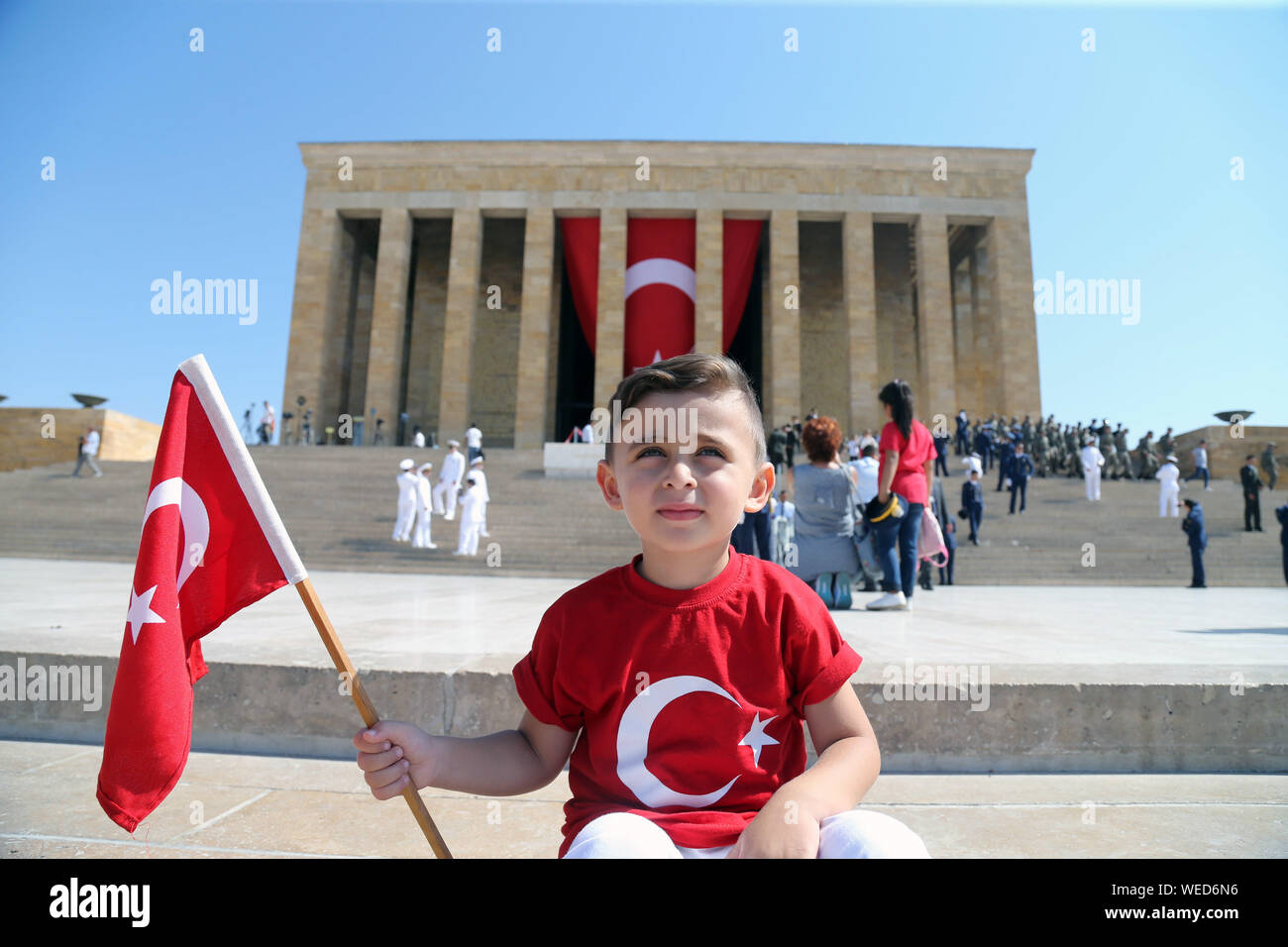 Ankara, Turkey. 30th Aug, 2019. A Turkish kid celebrates the 97th anniversary of Victory Day at the Ataturk Mausoleum in Ankara, Turkey, Aug. 30, 2019. Turkey marked on Friday the 97th anniversary of Victory Day, the day the Turks defeated the Greek forces at the Battle of Dumlupinar, the final battle of the Turkish War of Independence in 1922. Credit: Mustafa Kaya/Xinhua Credit: Xinhua/Alamy Live News Stock Photo