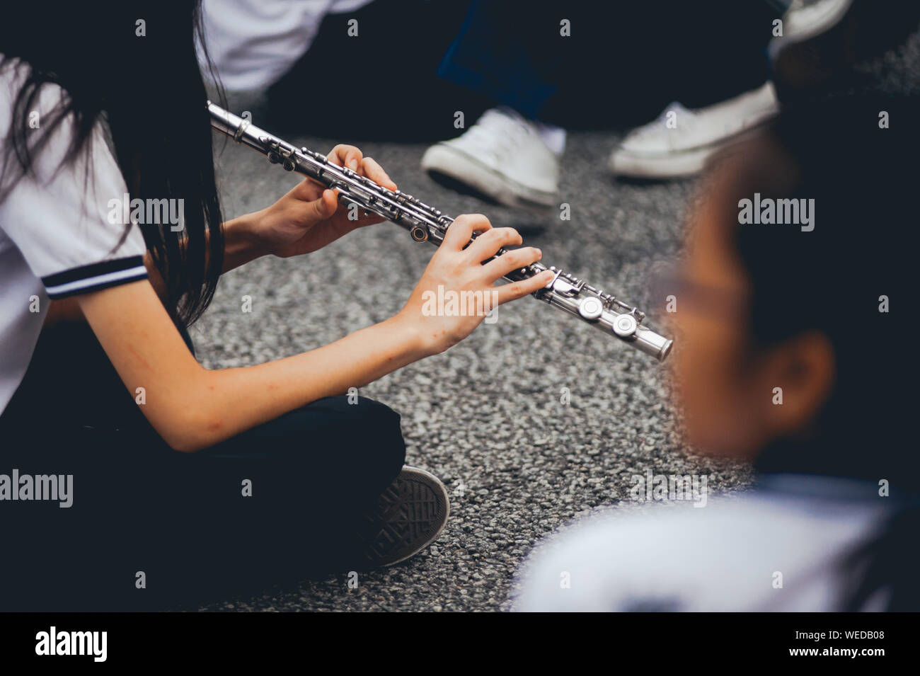 Girl Playing Flute Stock Photo Alamy