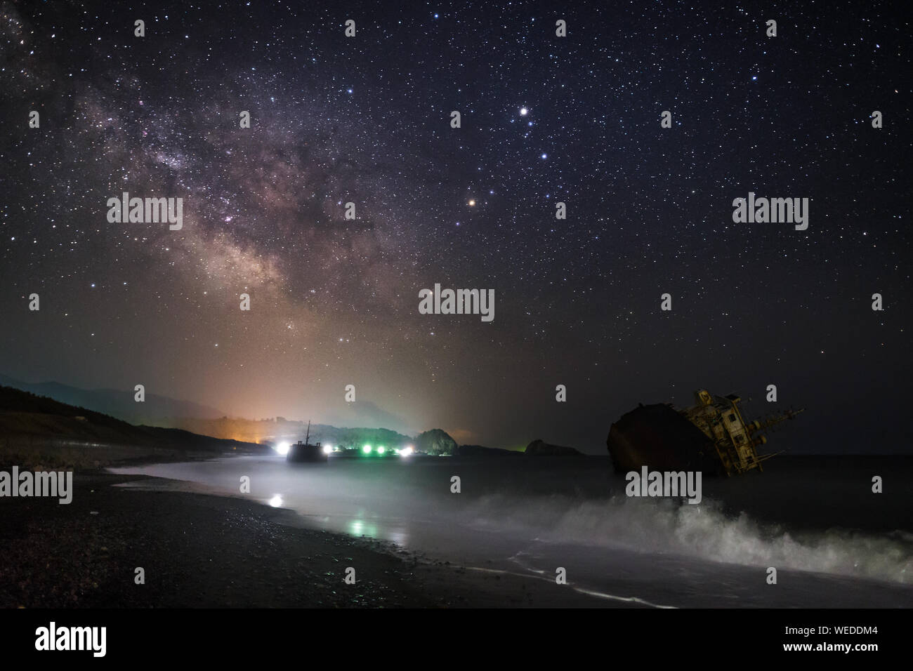 Bright Illuminated Milky Way And Constellations At Night Stock Photo